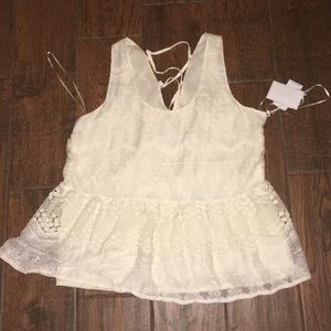 1.State silk layered boho style lace up tank